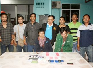 Rung Hokgenhul (right) and Rujiroj Theskhum have been arrested and charged with possessing 598 methamphetamine tablets.